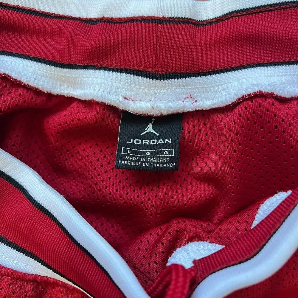 Vintage 80s/90s OG Air Jordan Wings Mesh Basketball Shorts Red & White Size L